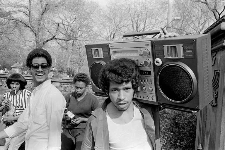 Black teen with a boombox radio