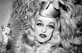 The drag-artist, Charles Pierce as Mae West