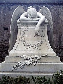 Angle weeping on gravestone 