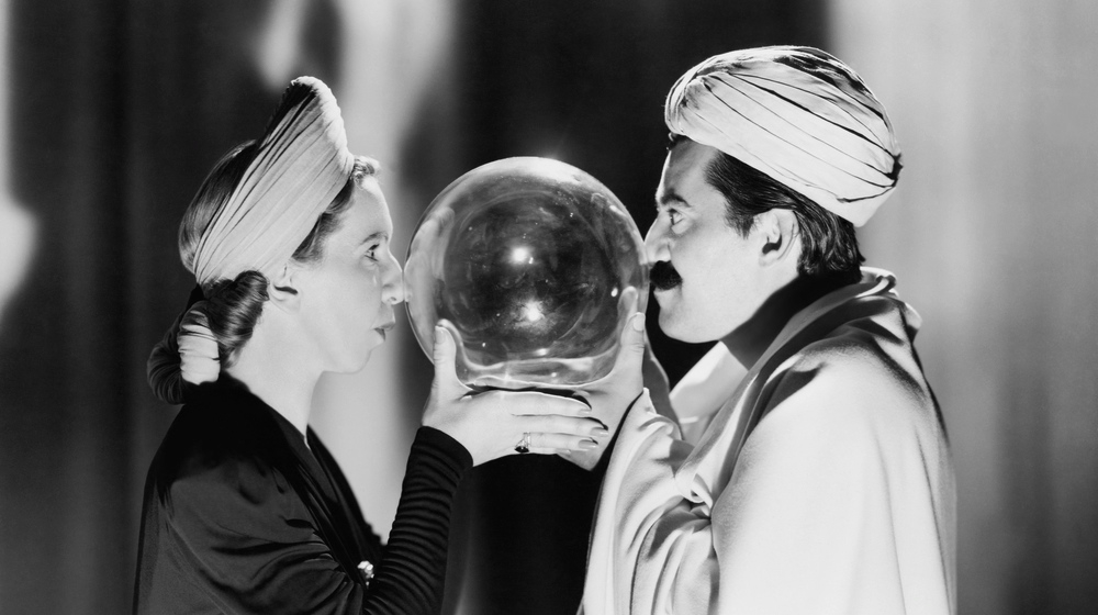 Comic fortune tellers with crystal ball