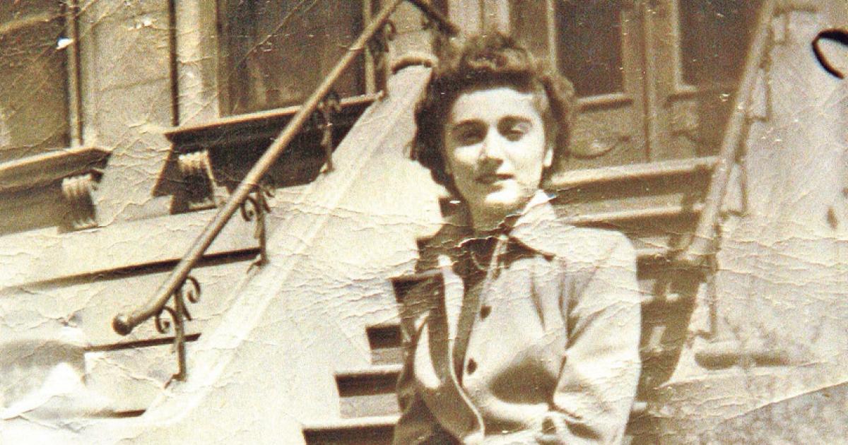 Kitty Genovese sitting on a stoop