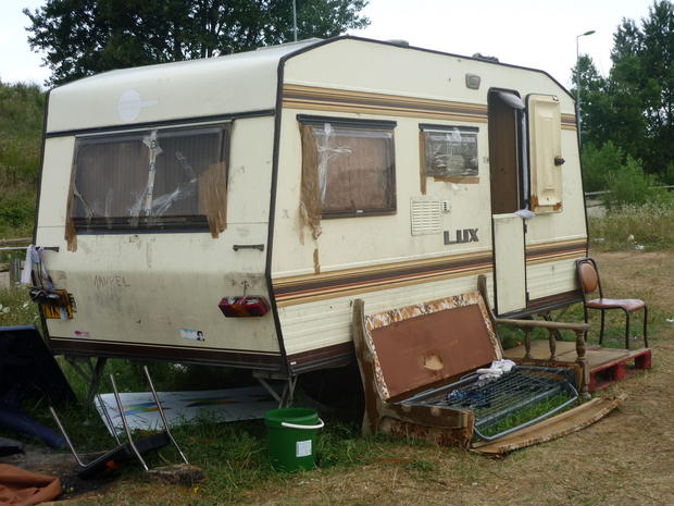 rundown mini trailer home. 