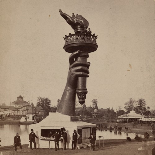 Statue of Liberty torch and hand under construction. 