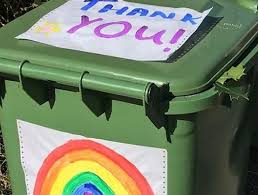 British trash bin decorated with rainbow and Thank You sign 
