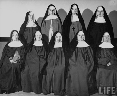 Group of unsmiling nuns 