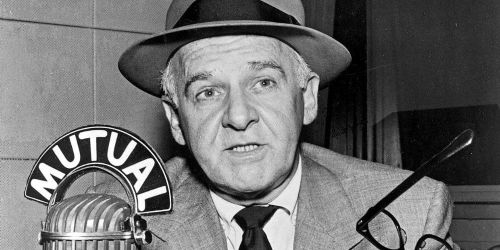 Walter Winchell at the radio microphone. 