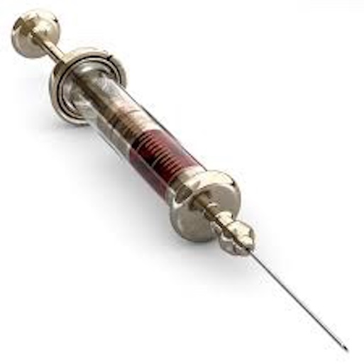 Vintage syringe filled with blood