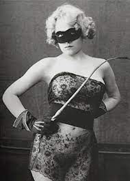 Vintage photo of S&M woman in mask 